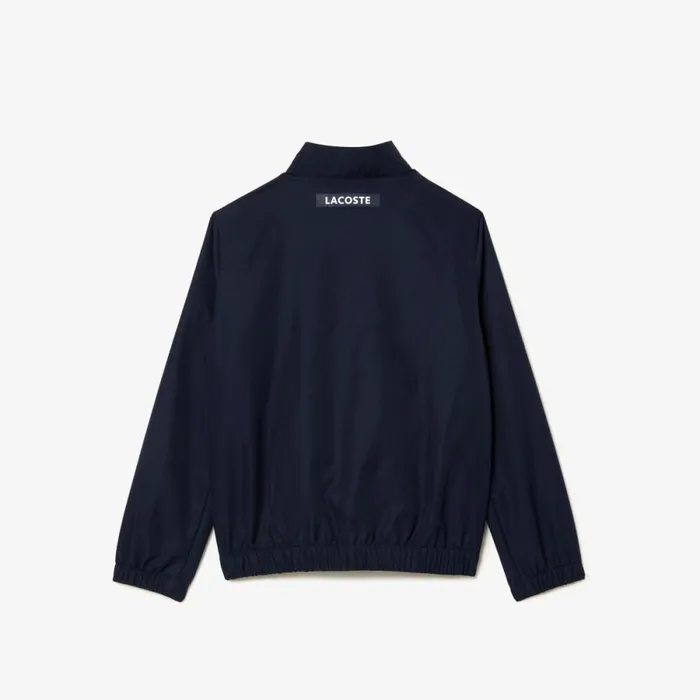 Pants and Shorts Kids Lacoste Kids039 Colorblock Tennis Sweatsuit Navy Blue Blue White Rig