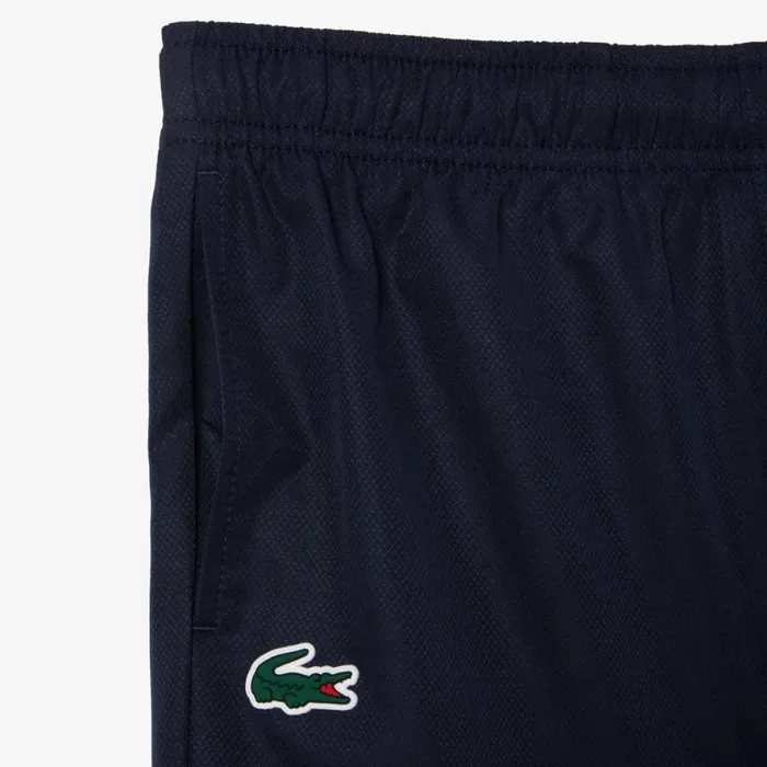 Pants and Shorts Kids Lacoste Kids039 Colorblock Tennis Sweatsuit Navy Blue Blue White Rig