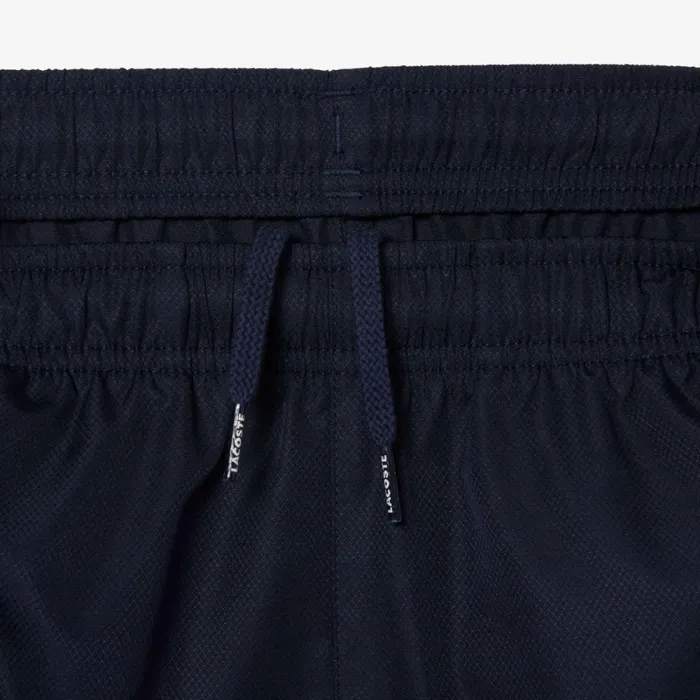 Pants and Shorts Kids Lacoste Kids039 Colorblock Tennis Sweatsuit Navy Blue Blue White Rig