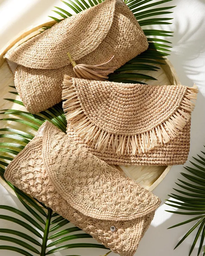 Tommy Bahama Handbags and Clutches Islamora Lux Crocheted Raffia Clutch Natural 8211 Women