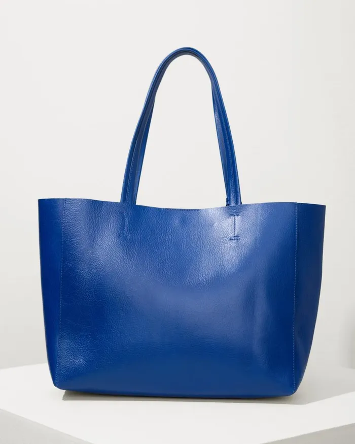 Tommy Bahama Handbags and Clutches Tommy Bahama Perforated Leather Tote Blue 8211 Women