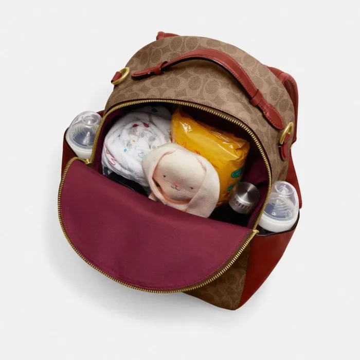 Women Baby Backpack In Signature Canvas Brasstanrust Coach Backpacks
