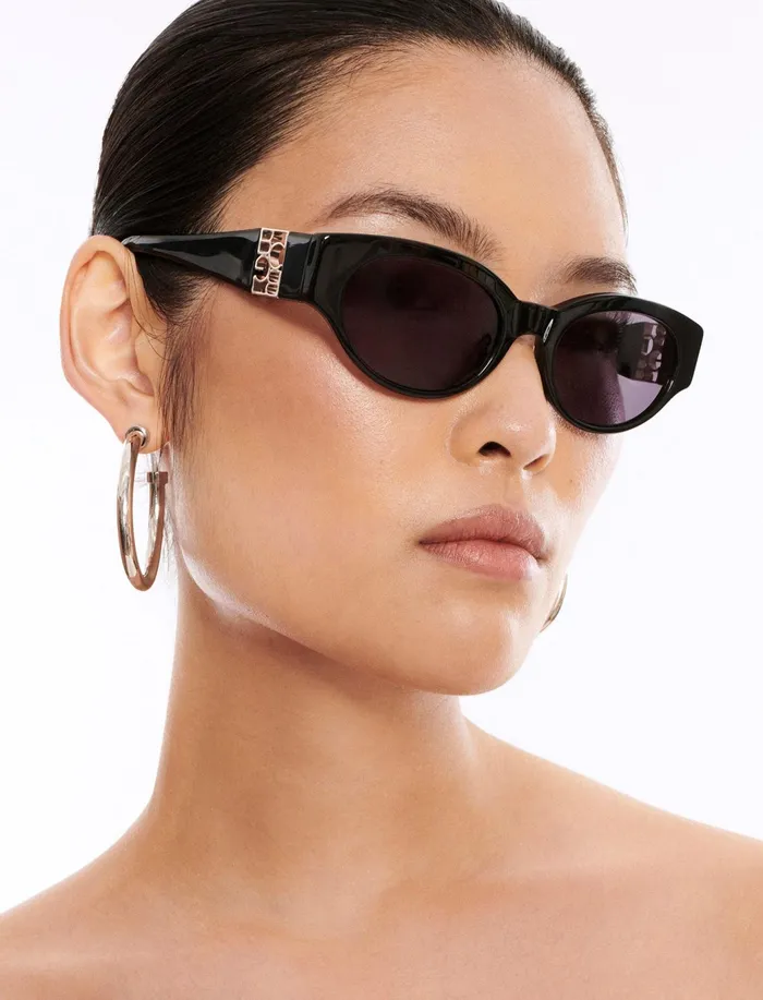 Women Sunglasses BCBG Black Signature Oval Sunglasses Black