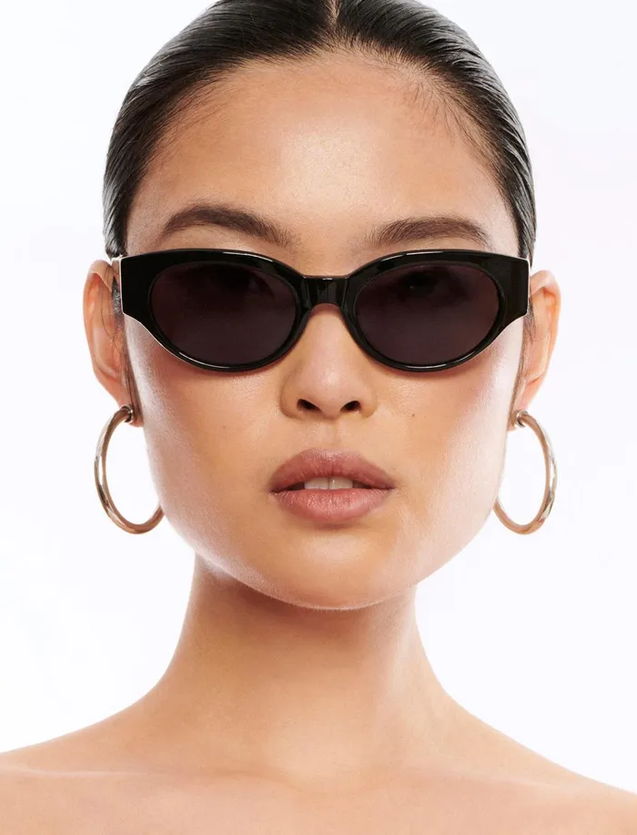 Women Sunglasses BCBG Black Signature Oval Sunglasses Black